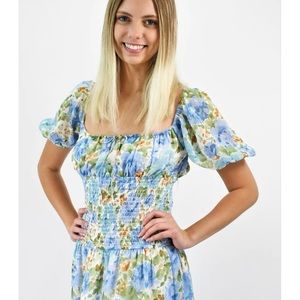 Sky to moon floral mini dress size S. Worn only once. Beautiful dress for spring